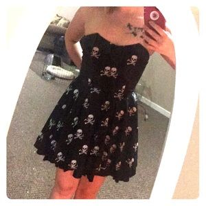 Zip up black and white skull dress.